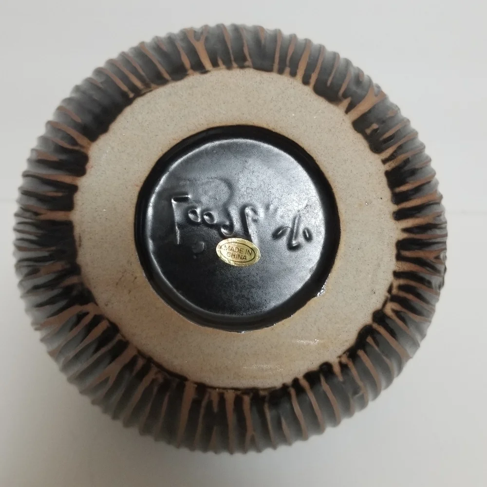 Vintage textured brown jar